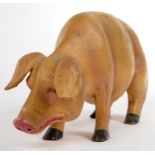 A CARVED AND PAINTED WOOD MODEL OF A PIG, 20CM H