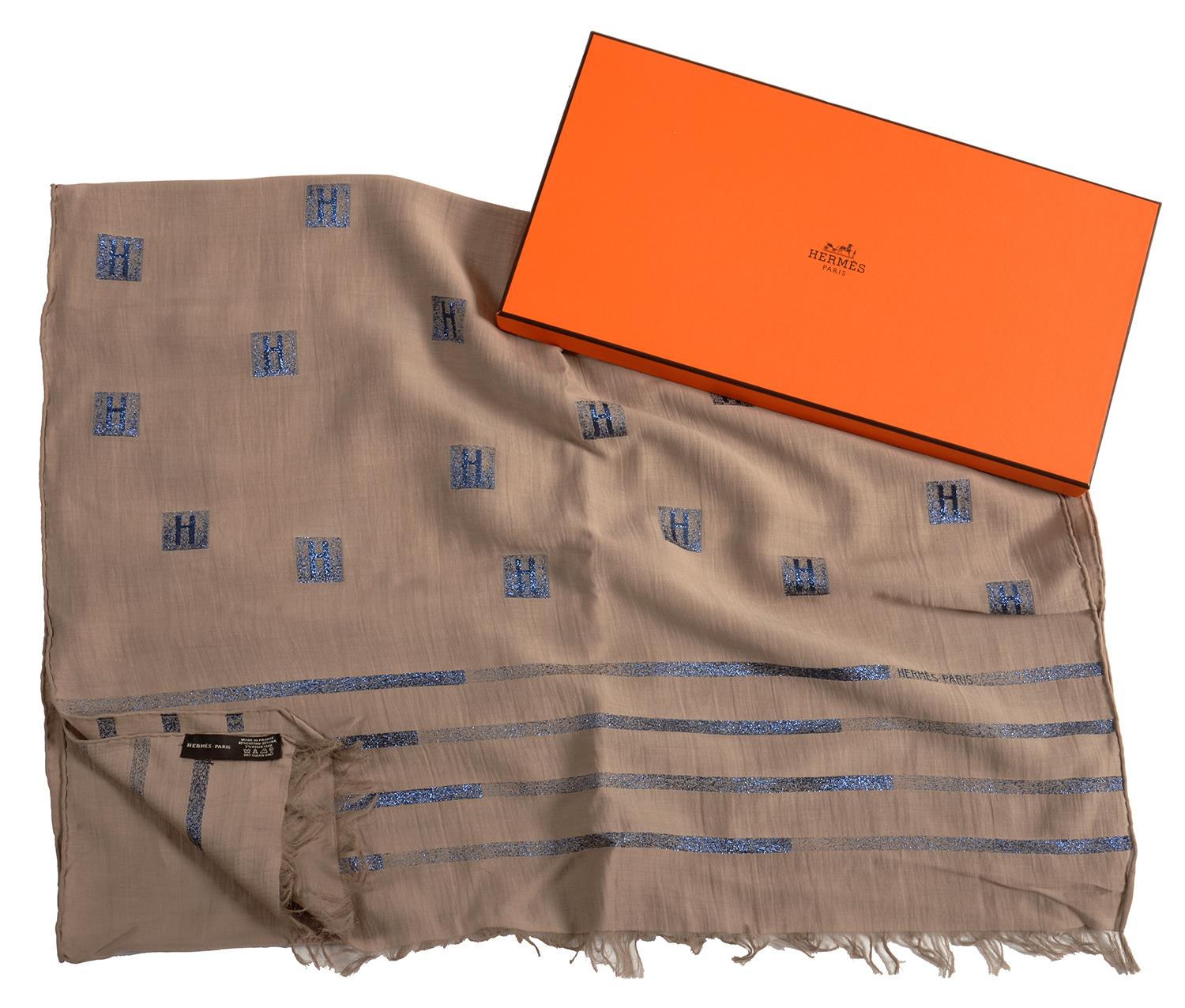 HERMÉS. 'CHECHE H' GREY AND BLUE GLITTER SILK AND COTTON STOLE, 188 X 63 CM, BOXED