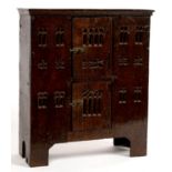 MINIATURE FURNITURE. AN EARLY  16TH CENTURY STYLE OAK BOARDED PRESS OR AUMBRY WITH TWO GOTHIC