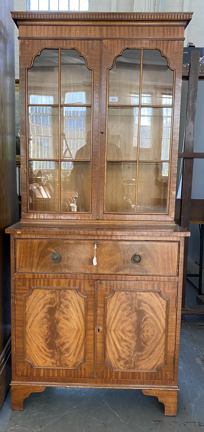 A MAHOGANY GLAZED BOOKCASE, THE LOWER PART ENCLOSED BY PANELLED DOORS, 175CM H