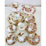 A ROYAL ALBERT OLD COUNTRY ROSES PATTERN TEA SERVICE  AND  A ROYAL ALBERT LADY HAMILTON PATTERN