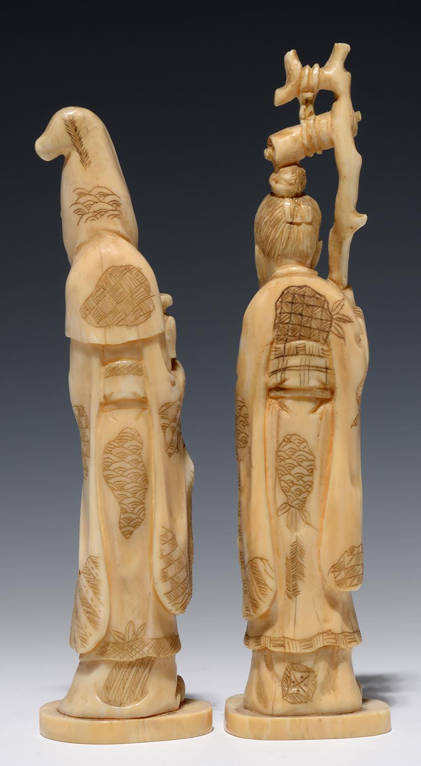 A PAIR OF JAPANESE IVORY OKIMONOS OF IMMORTALS, 14.5CM AND 15.5CM H, MEIJI PERIOD - Image 2 of 2