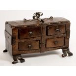 MINIATURE FURNITURE.  A 16TH C STYLE OAK AND WROUGHT IRON CHEST, ON SCROLL FEET, 24CM L