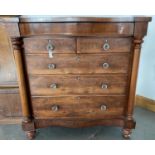 A VICTORIAN MAHOGANY CHEST OF DRAWERS, ON TURNED BUN FEET WITH LATER GLASS HANDLES, 138CM H X