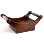 AN EARLY 19TH C MAHOGANY CHEESE COASTER, 43CM L