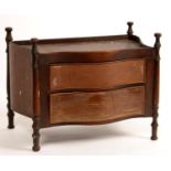 MINIATURE FURNITURE.  A GEORGE III STYLE SERPENTINE MAHOGANY COMMODE, 17CM H