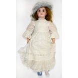 A GERMAN CHARACTER DOLL THE ARMAND MARSEILLE BISQUE HEAD WITH FIXED OVAL GLASS EYES,