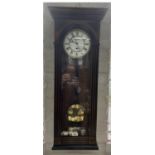 A WALNUT VIENNA WALL CLOCK WITH ENAMEL DIAL, C1930, 88CM H