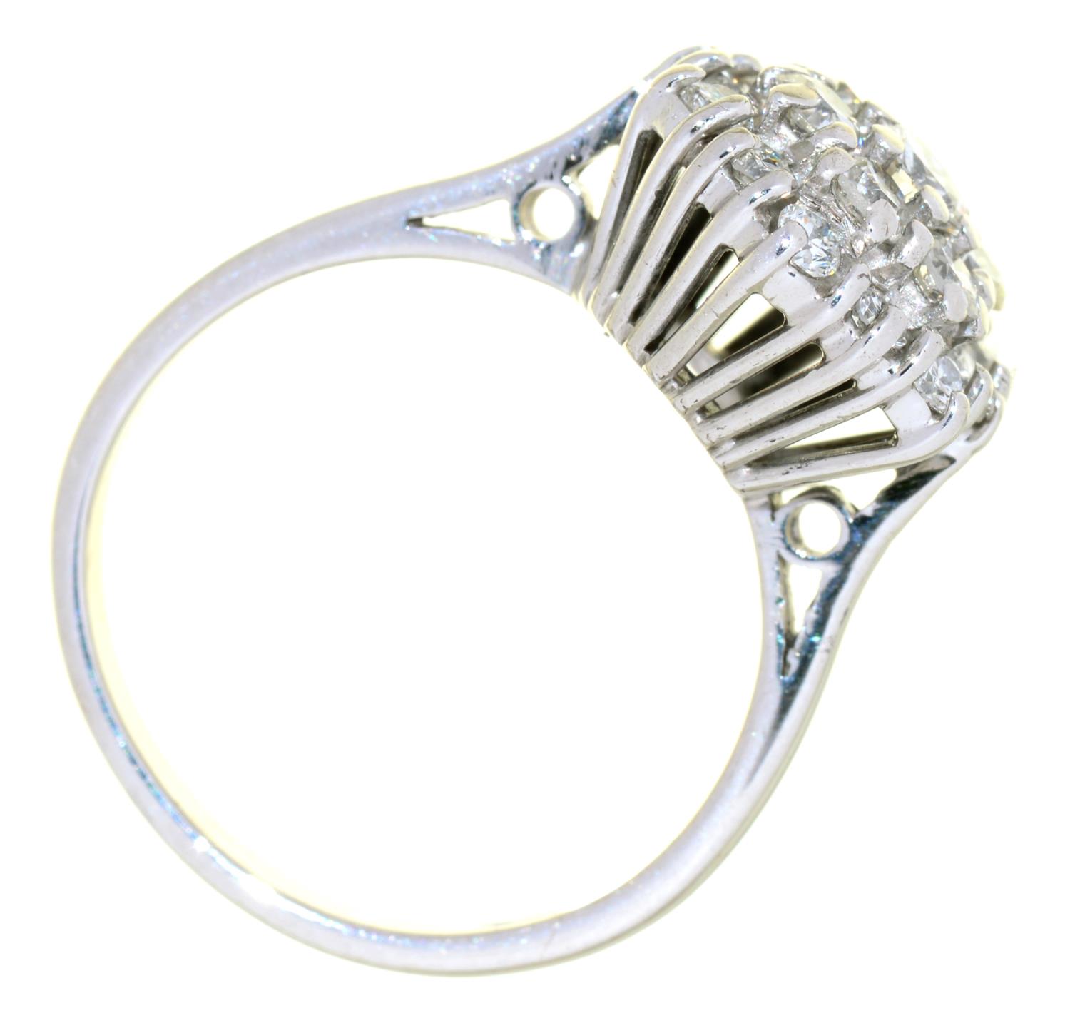 A DIAMOND CLUSTER RING IN WHITE GOLD, MARKED 18CT, 5.8G, SIZE M NO DAMAGE TO STONES. LIGHT SURFACE - Image 2 of 2