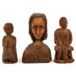 A PRIMITIVE OAK CARVING OF A SEATED MAN, 15CM H, ANOTHER OF A FIGURE AT PRAYER AND A SLIGHTLY LARGER