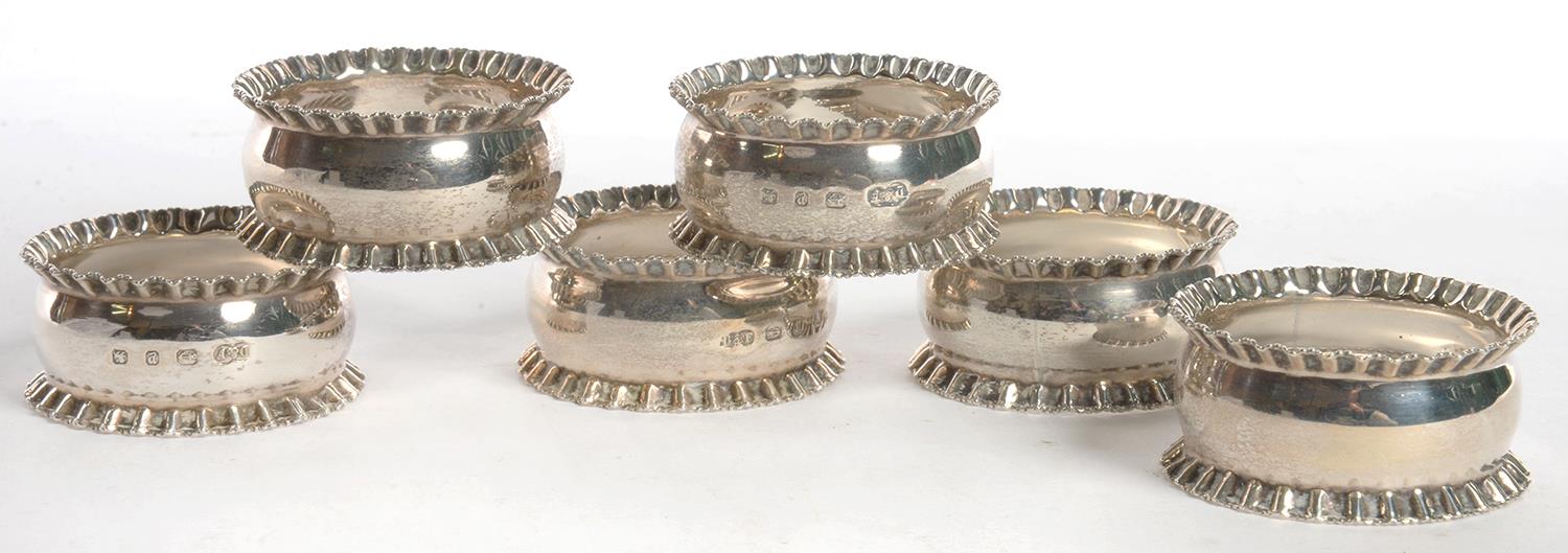 A SET OF SIX VICTORIAN SILVER NAPKIN RINGS, BY DEAKIN & FRANCIS, BIRMINGHAM 1898, 3OZS 10DWTS GOOD