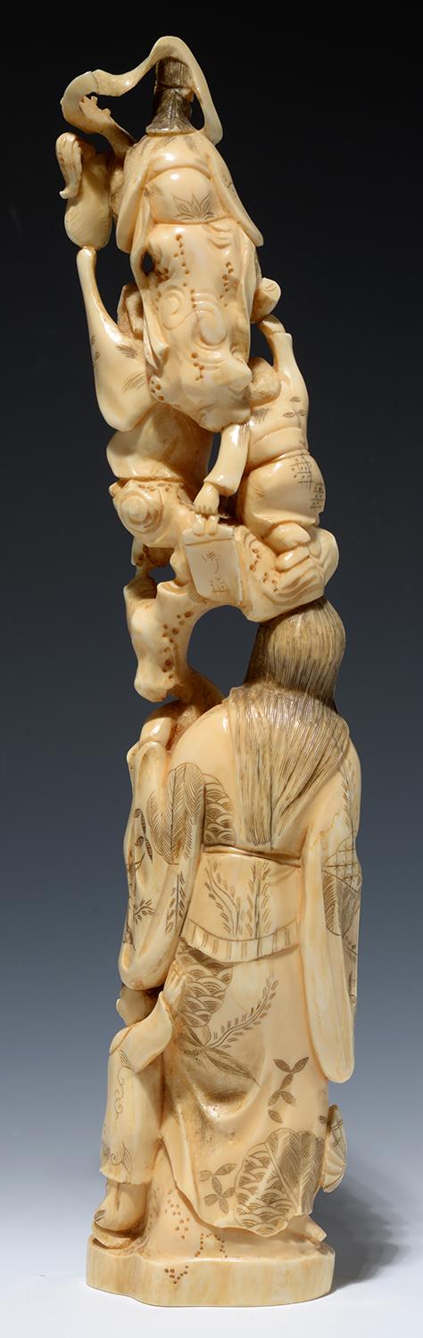 A JAPANESE IVORY OKIMONO OF IMMORTALS, 35.5CM H, MEIJI PERIOD - Image 2 of 2