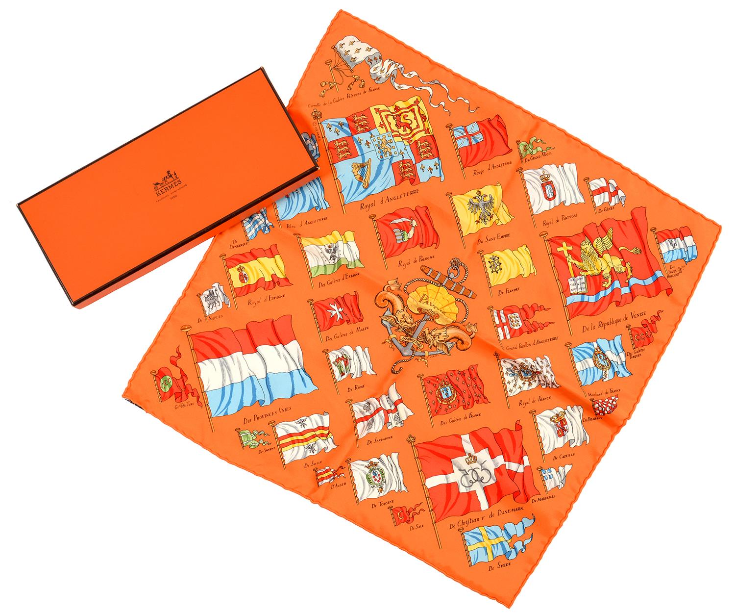 HERMÉS. 'PAVOIS' ORANGE SILK BANDANA SCARF, 46 X 46 CM, BOXED