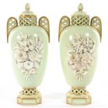 A PAIR OF BROWN, WESTHEAD-MOORE & CO RETICULATED CELADON GROUND VASES AND COVERS, THE VASES