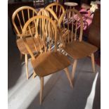 A SET OF SIX ERCOL ASH DINING CHAIRS