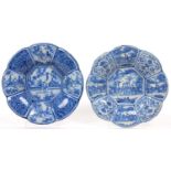 TWO FRANKFURT FAIENCE  DISHES, BUCKELPLATTE, PAINTED WITH ORIENTAL FIGURES IN PANELLED BORDER, THE