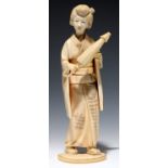 A JAPANESE IVORY OKIMONO OF A BIJIN HOLDING A PARASOL, 22.5CM H, SIGNED ON RED SEAL, MEIJI PERIOD