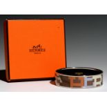 HERMÉS. ENAMEL BANGLE, 65 MM DIAM, BOXED