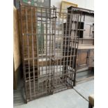 A WROUGHT IRON WINE CAGE,164CM H X 103CM W