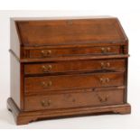 MINIATURE FURNITURE. A GEORGE III STYLE MAHOGANY BUREAU, 26CM H