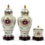 ONE AND A PAIR OF CHINESE  REPRODUCTION ARMORIAL JARS AND COVERS, LARGEST 35CM H, WITH STANDS