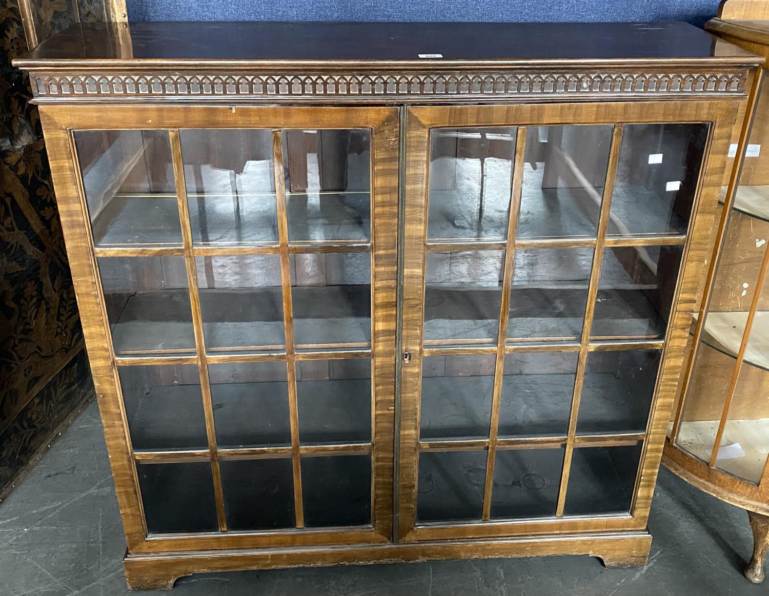 A MAHOGANY GLAZED BOOKCASE, 120CM H X 121CM W