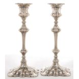 A PAIR OF EPNS CANDLESTICKS, 24 CM H, BY ELKINGTON & CO, MID 19TH C IN GOOD CONDITION. LIGHT WEAR