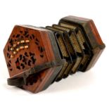 A VICTORIAN FRETTED MAHOGANY CONCERTINA, POOR CONDITION