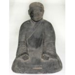 A CHINESE GREY POTTERY SCULPTURE OF A SEATED FIGURE, WITH DETACHABLE HEAD, 44CM H