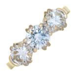 A DIAMOND THREE STONE RING IN WHITE GOLD, MARKED 18CT, 4.4G, SIZE M ½ NO DAMAGE TO DIAMONDS. THE