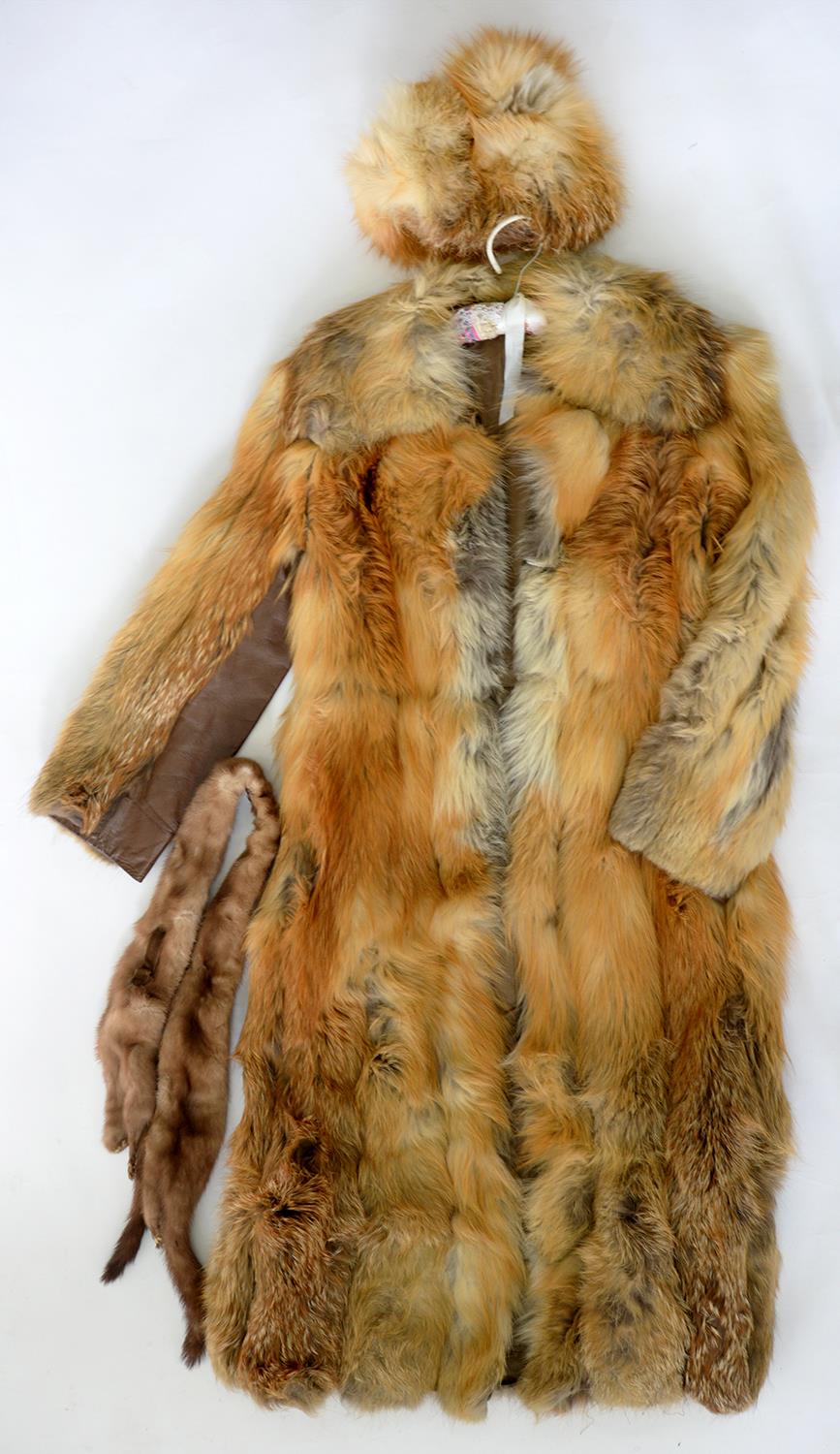 A FUR COAT, HAT AND STOLE