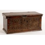 MINIATURE FURNITURE. A CHARLES I STYLE OAK CHEST WITH BOARDED LID AND CARVED FRONT WITH IRON