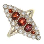 AN ALMANDINE GARNET AND DIAMOND MARQUISE STYLE TRIPLE CLUSTER RING IN WHITE GOLD, MARKED 15CT, 3.8G,