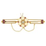 AN OPAL, DIAMOND AND RUBY BAR BROOCH IN GOLD, 50 MM W, UNMARKED, 5.8G NO DAMAGE TO STONE. LIGHT