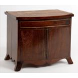 MINIATURE FURNITURE. A GEORGE III STYLE MINIATURE BOW FRONTED MAHOGANY AND LINE INLAID COMMODE