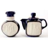 A RUSSIAN COBALT GROUND PORCELAIN TEAPOT AND COVER AND TEA CADDY AND COVER, EACH WITH M0ULDED