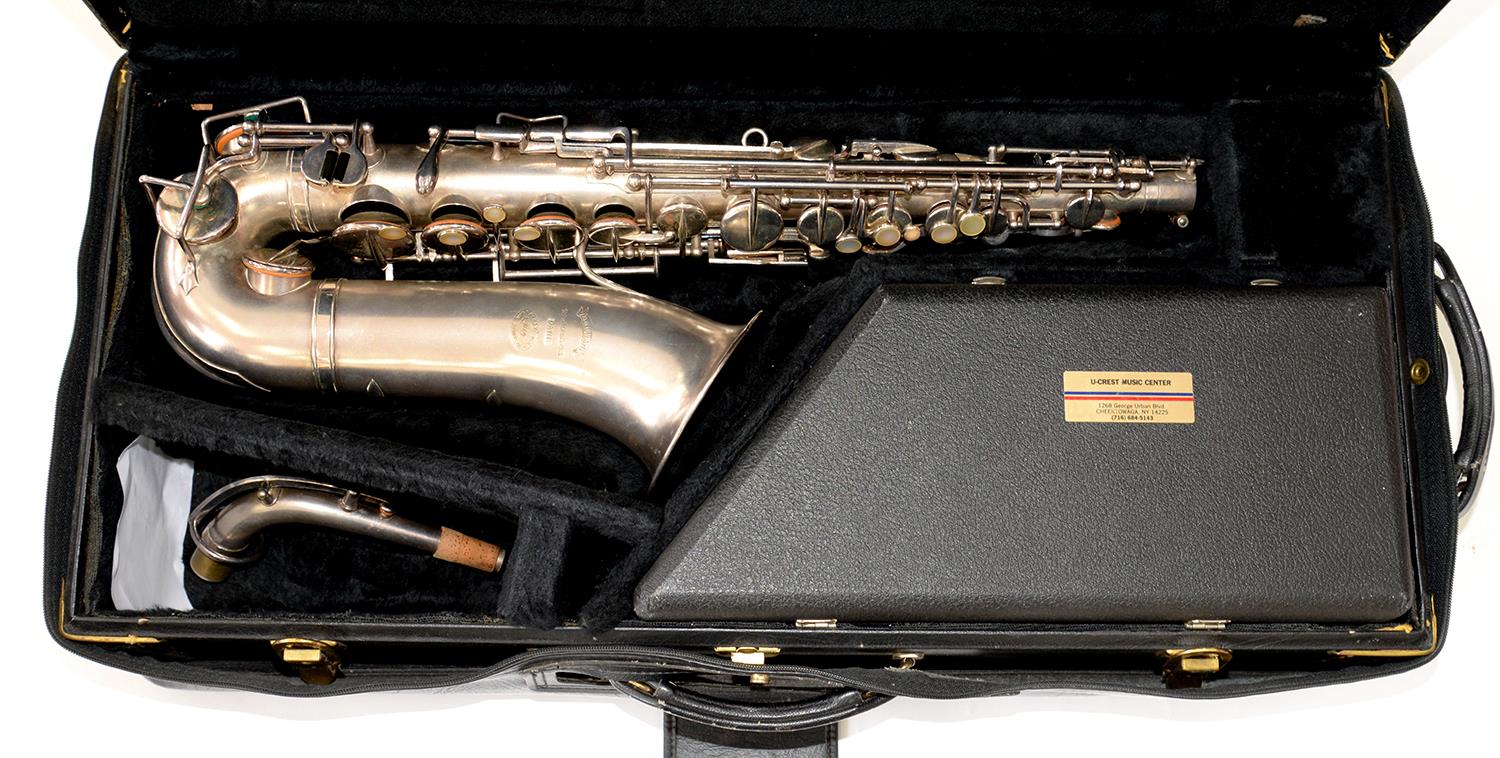 A FRENCH SILVER PLATED ALTO SAXOPHONE C1929, RENE GUENOT PARIS, CASED