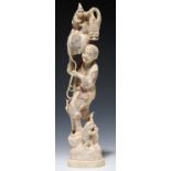 A JAPANESE IVORY OKIMONO OF A MONKEY TRAINER, 1.5CM H, SIGNED, MEIJI PERIOD