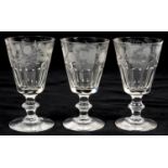 A SET OF THREE VICTORIAN ALE GLASSES, THE FACET CUT BOWL ENGRAVED WITH HOPS AND BARLEY, 11CM H, MID