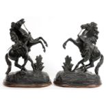 A PAIR OF FRENCH FIN DE SIECLE BRONZED SPELTER REDUCTIONS OF THE MARLY HORSES, EBONISED WOOD BASE,