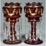 A PAIR OF 19TH C ENAMELLED AND GILT RUBY GLASS LUSTRES WITH PRISMATIC CUT GLASS BEADS AND