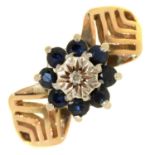 A SAPPHIRE AND DIAMOND CLUSTER RING, IN 9CT GOLD WITH PIERCED SHOULDERS, 4G, SIZE M Hoop with two