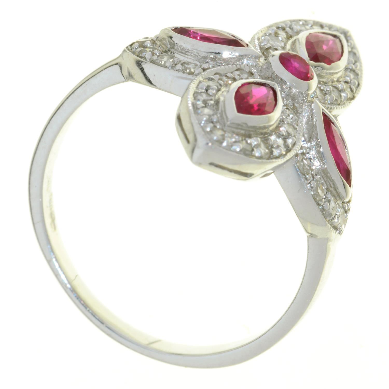 A RUBY AND DIAMOND QUADRUPLE CLUSTER RING OF CRUCIFORM DESIGN, WITH NAVETTE SHAPED RUBIES, IN 18CT - Image 2 of 2