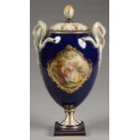 A MEISSEN OVIFORM VASE AND PIERCED COVER, WITH ENTWINED SERPENT HANDLES, THE VASE PAINTED TO