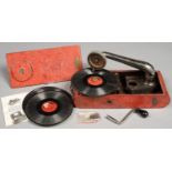 A THORENS EXCELLDA RED JAPANNED PORTABLE GRAMOPHONE, THE FOLDING FRONT WITH BRASS LABEL, ETCHED