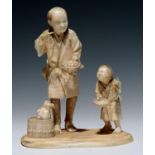 A JAPANESE IVORY OKIMONO OF A MAN AND HIS YOUNG SON, THE MAN HOLDING A TORTOISE AND PIPE, 12CM H,