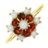 A GARNET AND CULTURED PEARL RING, IN 9CT GOLD, LONDON 1988, 2.1G, SIZE L Good condition