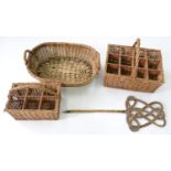 THREE VARIOUS BASKETS AND A VICTORIAN CARPET BEATER