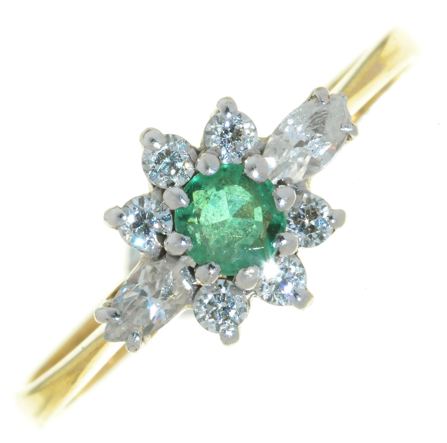 AN EMERALD AND DIAMOND CLUSTER RING, IN 9CT GOLD, LONDON 1987, 1.6G Good condition