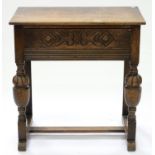 A VICTORIAN CARVED OAK SIDE TABLE ON STRETCHER BASE, 80CM H; 77 X 45CM Top surface rubbed and